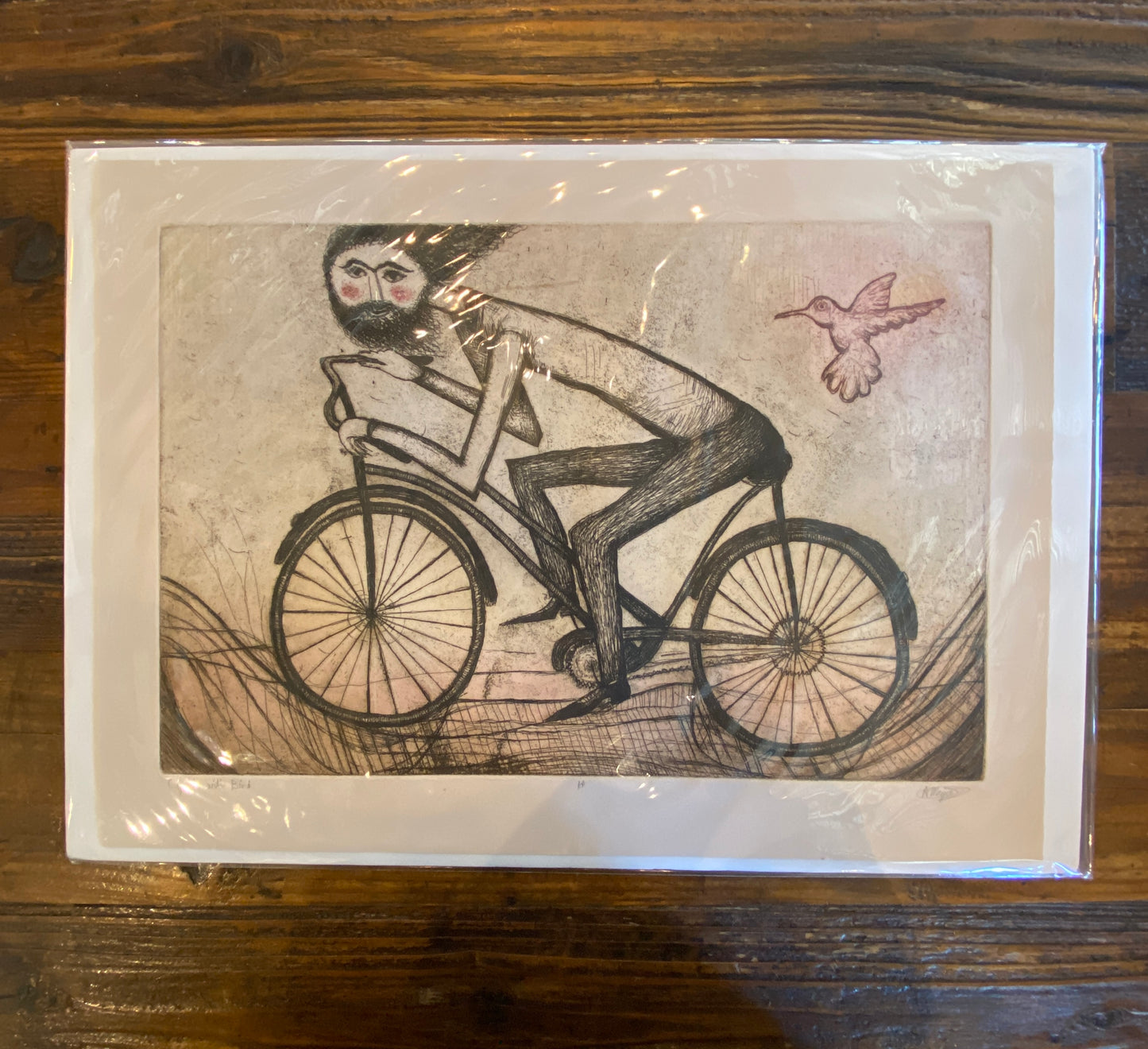 Cyclist with Bird