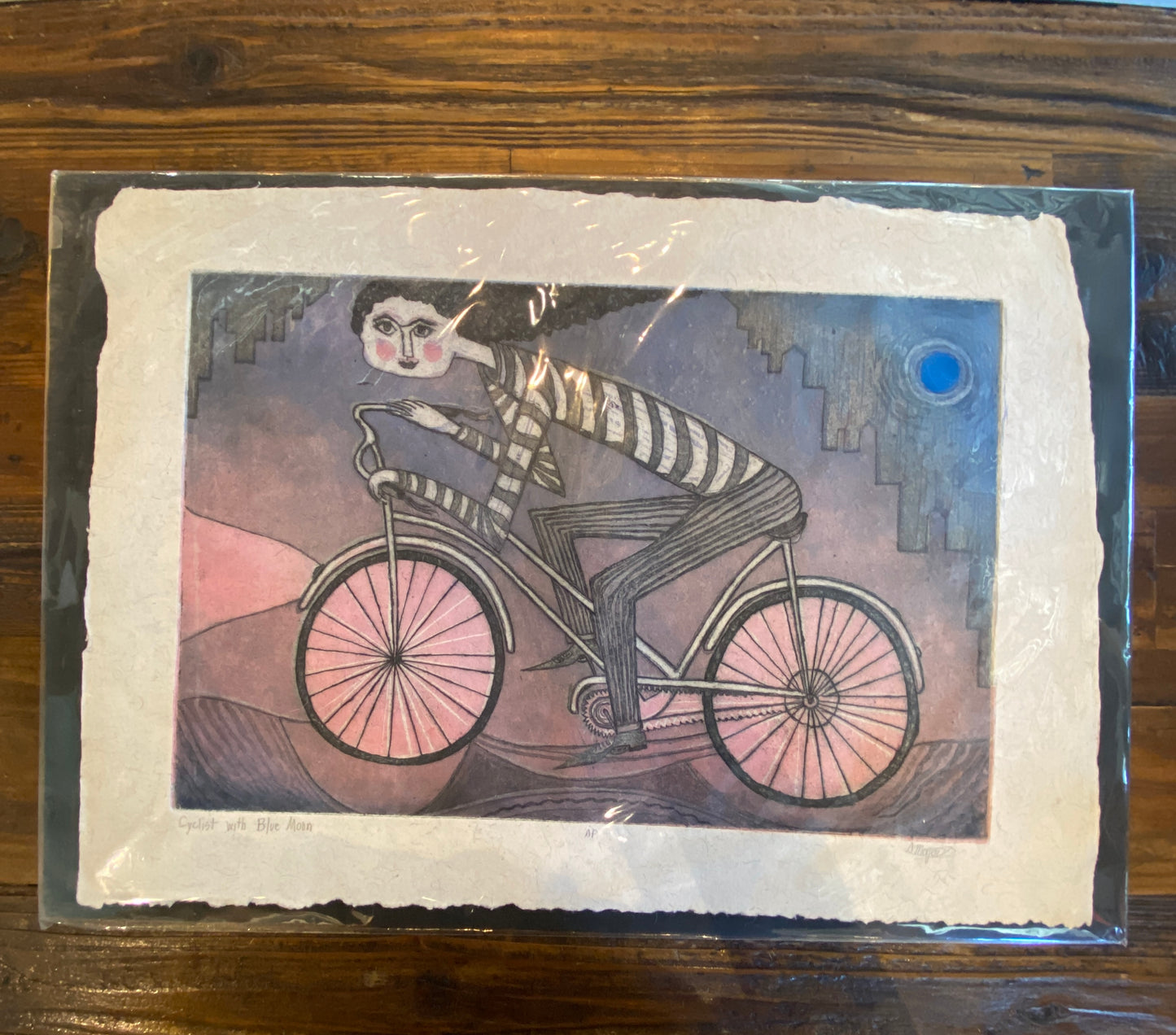 Cyclist with Blue Moon